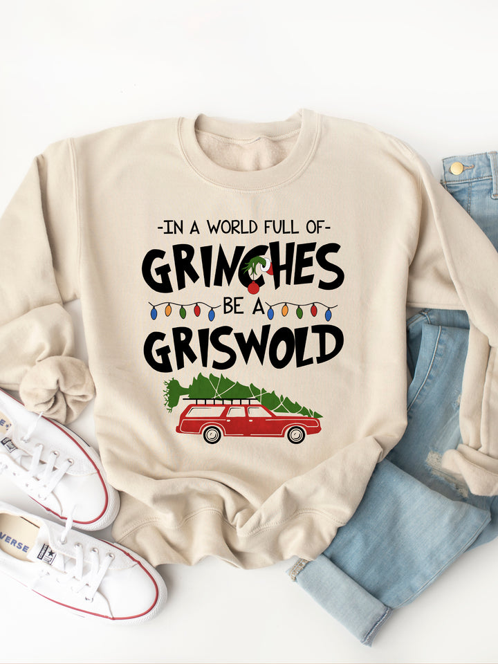 In A World Full Of Grinches, Be A Griswold Graphic Sweatshirt