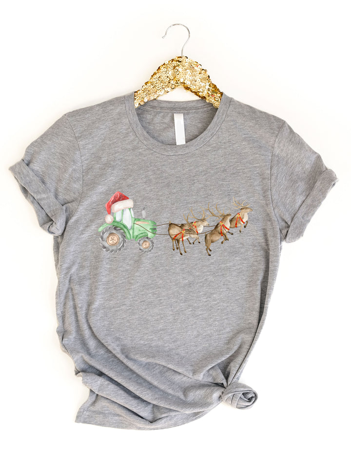 Reindeer pulling Deere Tractor Graphic Tee