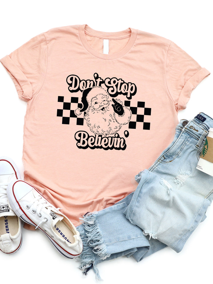 Don't Stop Believing Santa Graphic Tee