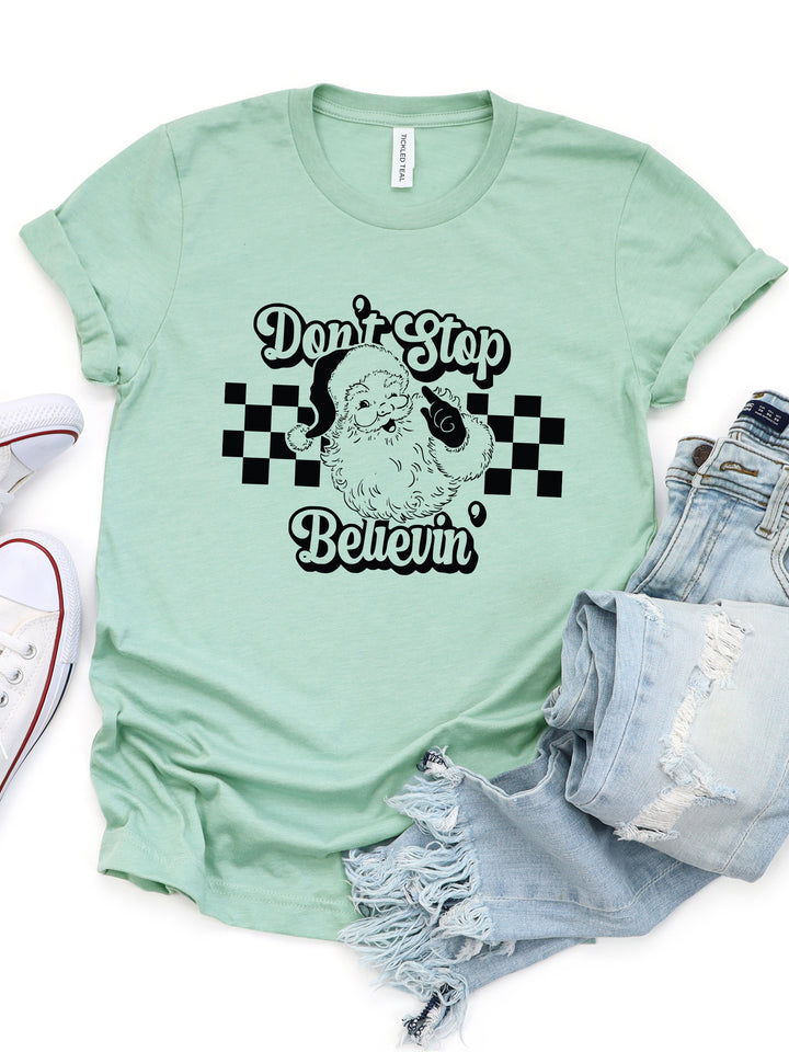 Don't Stop Believing Santa Graphic Tee