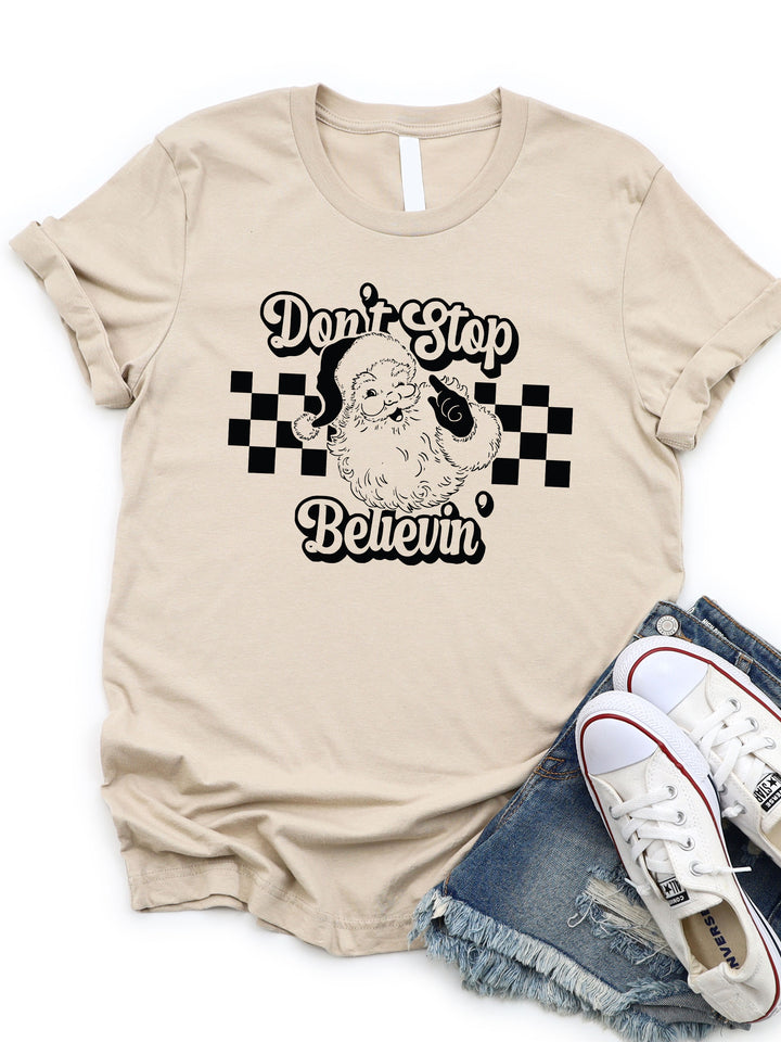 Don't Stop Believing Santa Graphic Tee