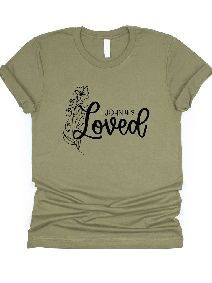 Loved 1 John 4:19 Graphic Tee
