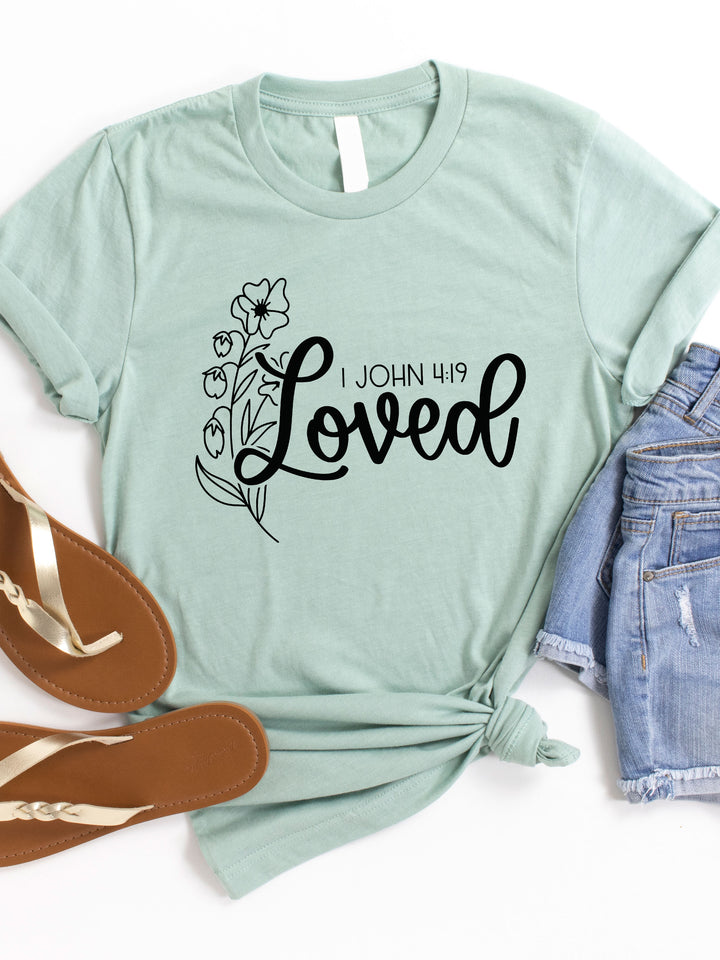 Loved 1 John 4:19 Graphic Tee
