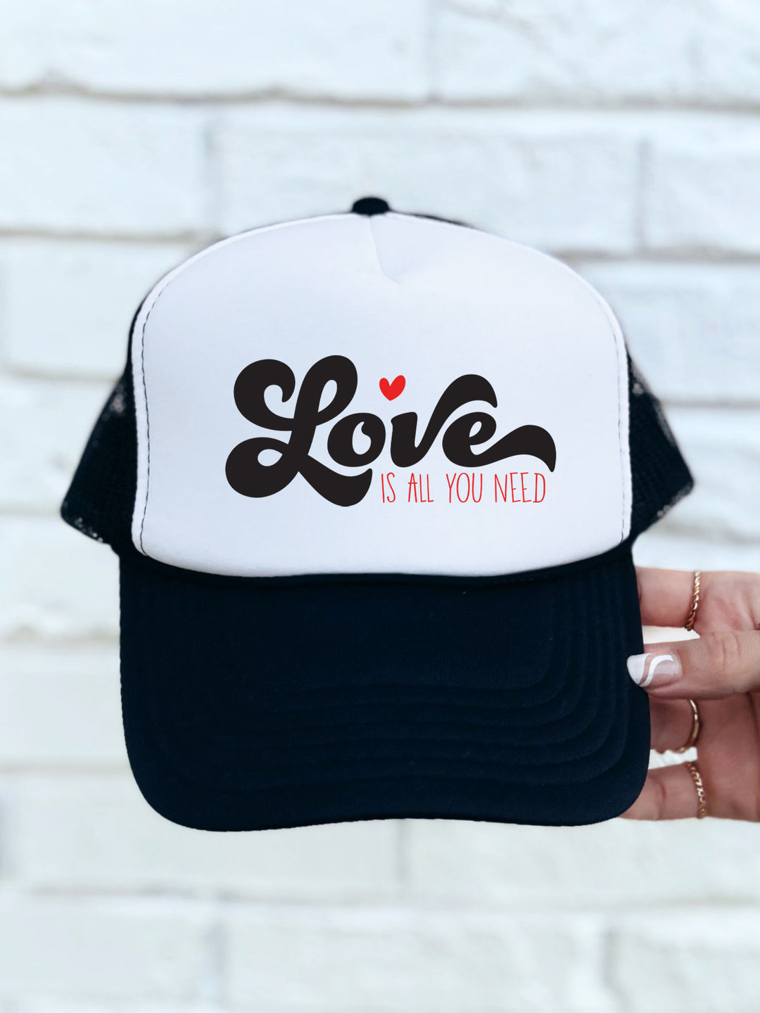 Love is all you need Trucker Hat