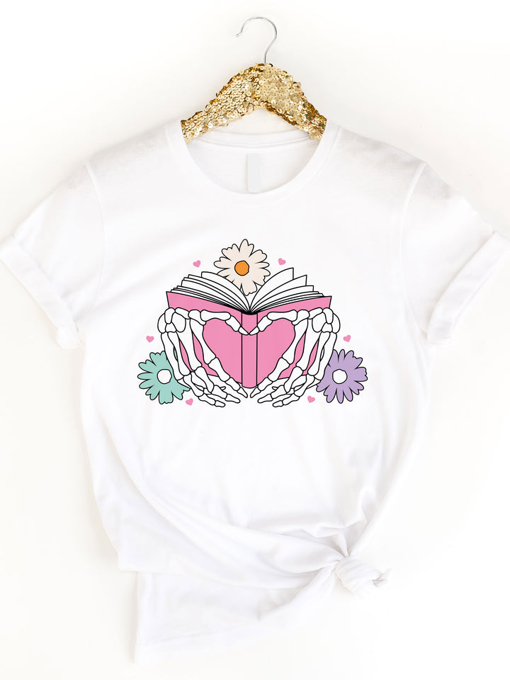 Skeleton Hand Heart Book Graphic Tee