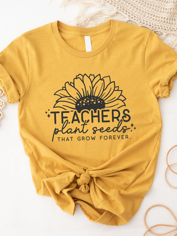 Teachers Plant Seeds That Grow Forever Graphic Tee