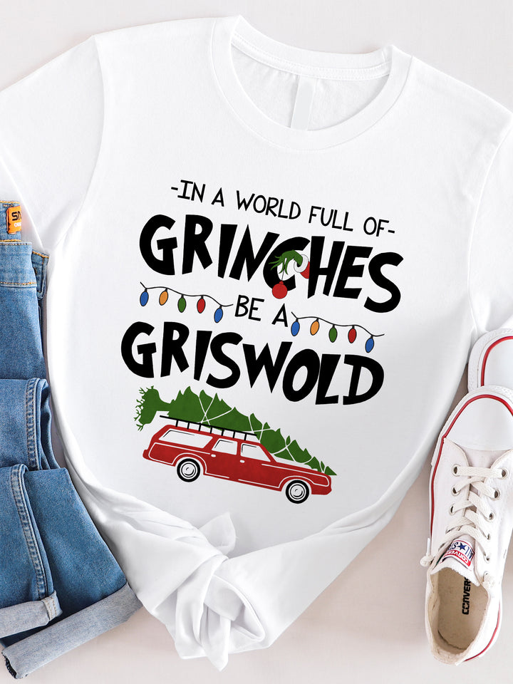 In a world full of Grinches Be a Griswold Graphic Tee