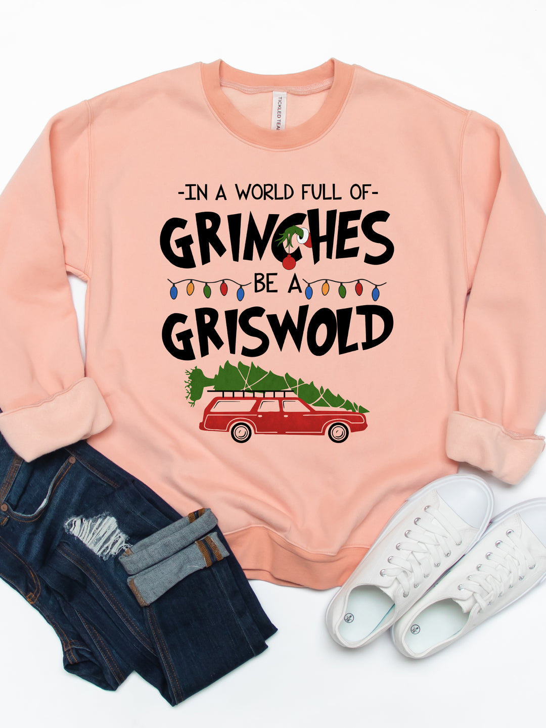 In A World Full Of Grinches, Be A Griswold Graphic Sweatshirt