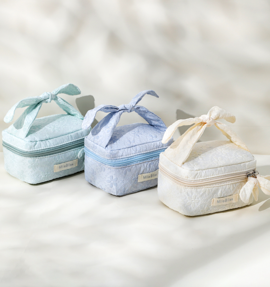 Floral Pattern Bow Tie Quilted Cosmetic Case