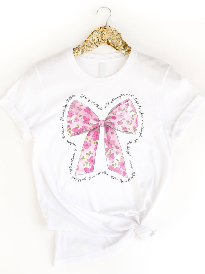 She is Clothed in Strength Floral Bow Graphic Tee