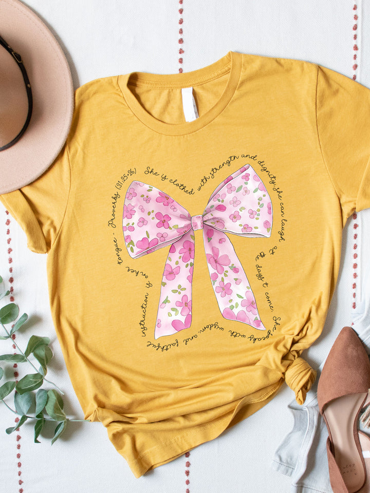 She is Clothed in Strength Floral Bow Graphic Tee