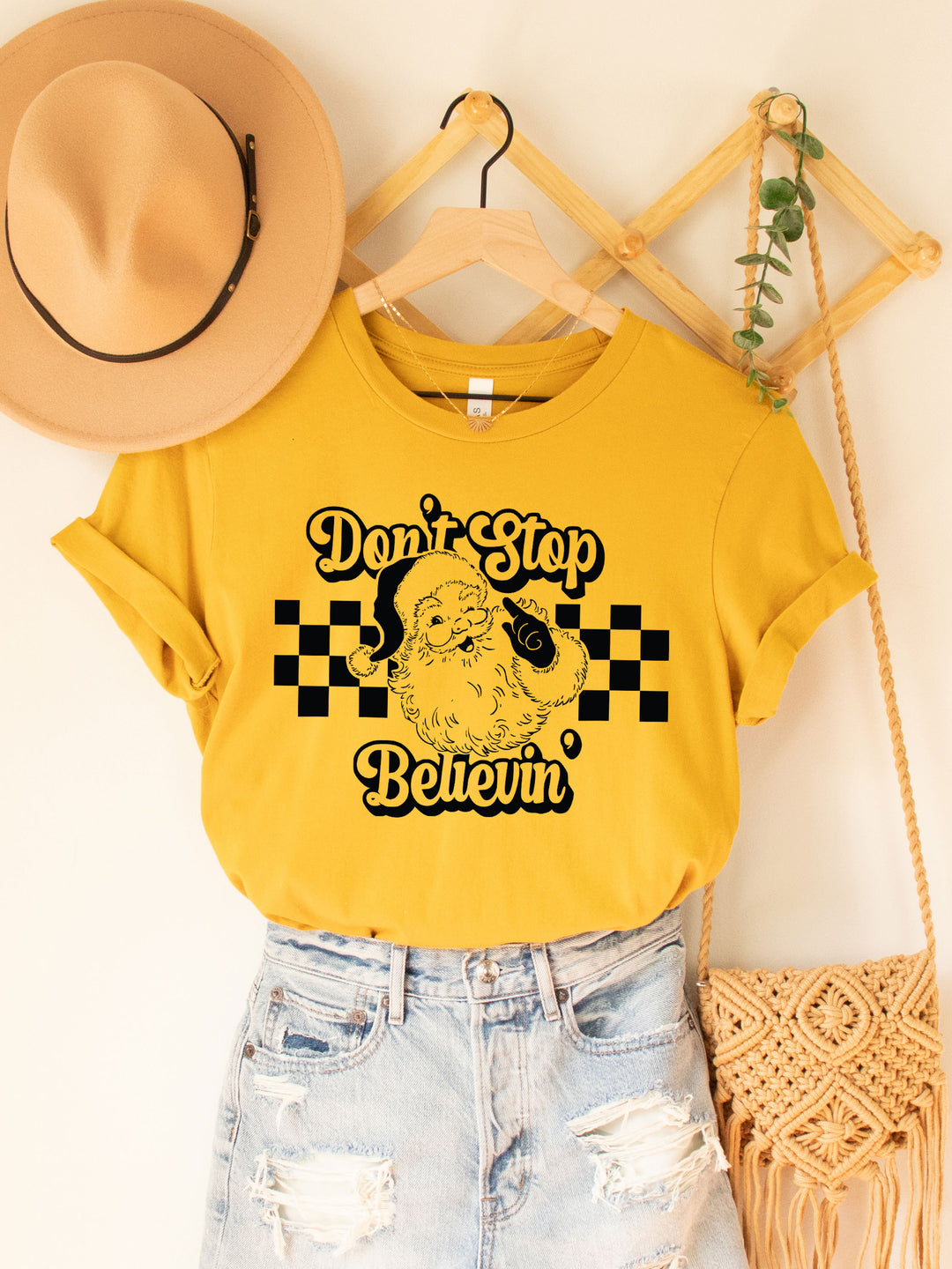 Don't Stop Believing Santa Graphic Tee