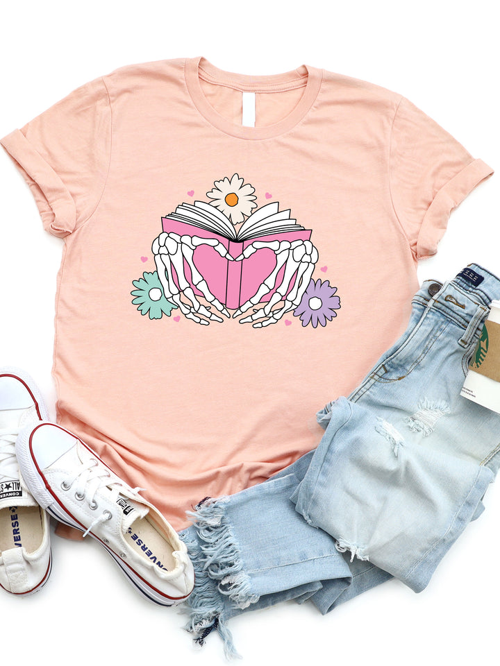 Skeleton Hand Heart Book Graphic Tee