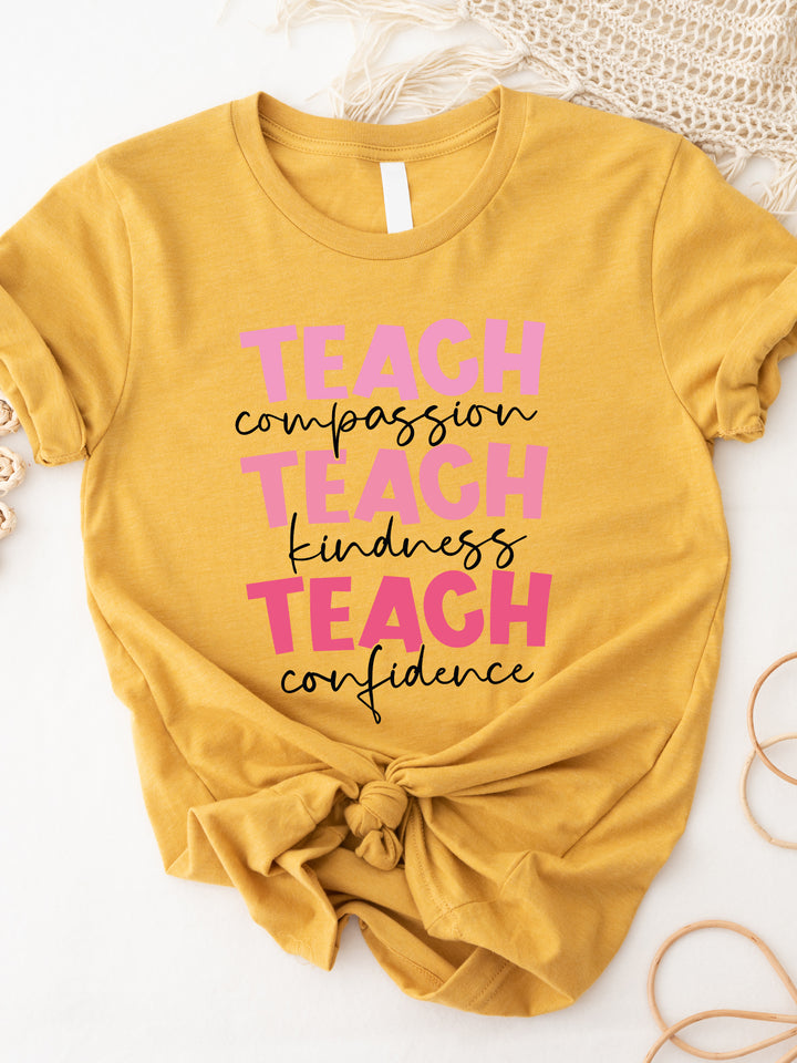 Teach Compassion Kindness Confidence Graphic Tee